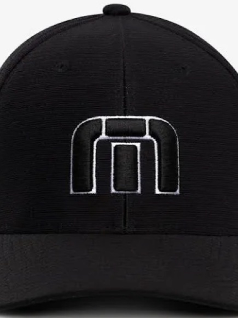 Travis Mathew Black Baseball Cap with White Outline Logo